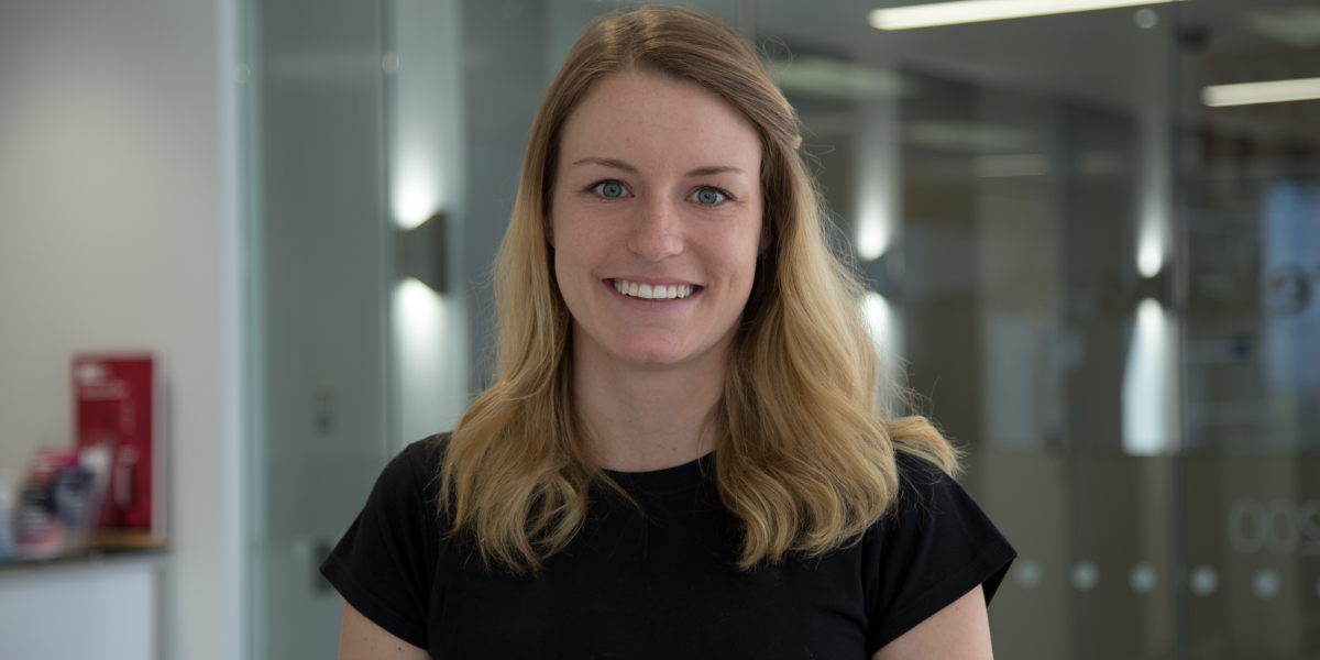 Woman with glass door background